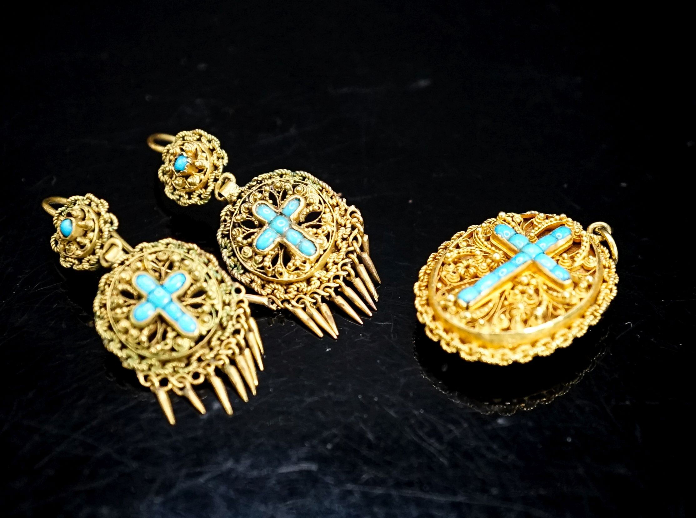 A Victorian yellow metal and turquoise set oval memorial pendant, 24mm, gross 7.5 grams and a pair of similar gilt metal tassel drop earrings.